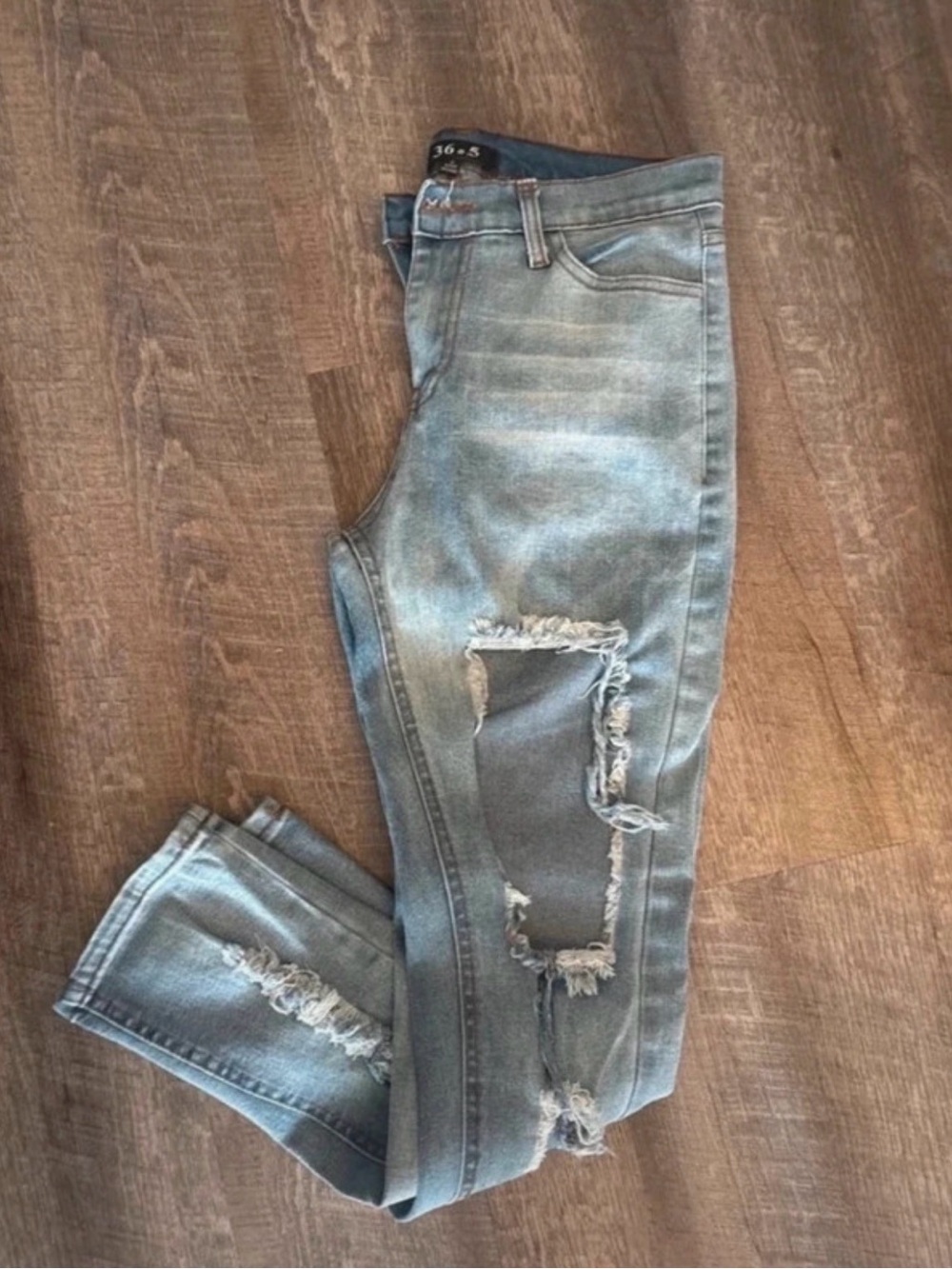 Women's Distressed Light Blue Ankle Jeans